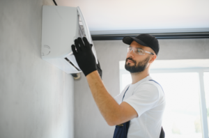 Customer completing finance application form for HVAC services with Affordable Air